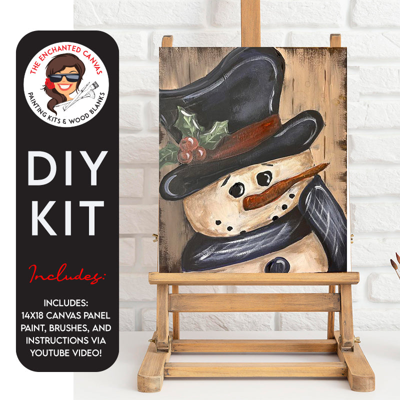 Vintage Snowman DIY Painting Kit. This smiling snowman has a happy face complete with coal eyes, and smile and orange carrot nose. He wears a large black top hat with red band and has holly berries and green leaves by the band. his neck is adorned with a black scarf. An overall brown brush effect is laid overtop to give a vintage feel