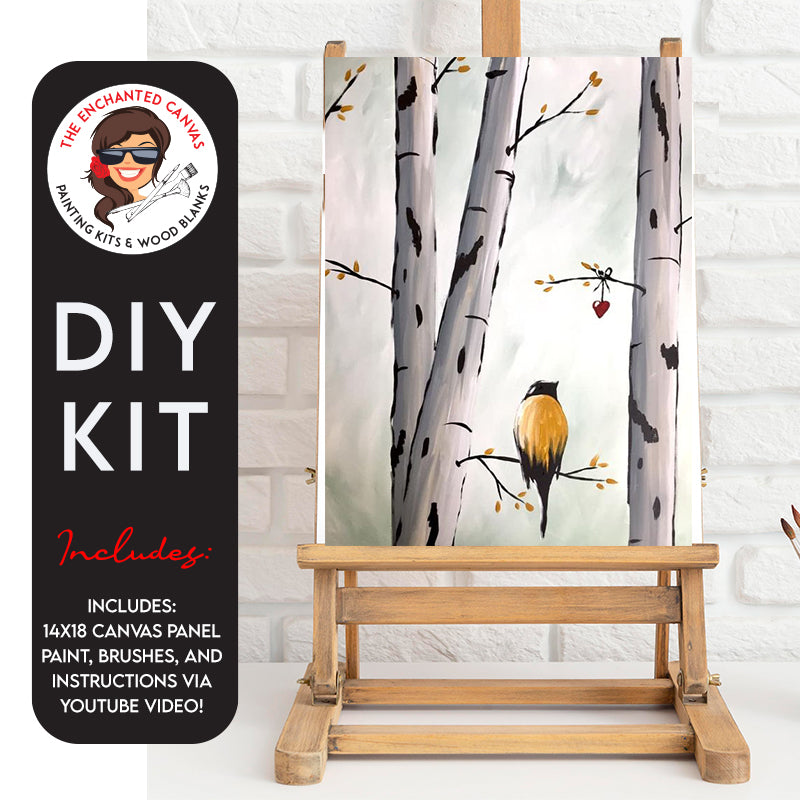 Embrace the beauty of nature with the DIY Birch on a Birch Tree Painting Kit! This enchanting painting captures the essence of birch trees set on a neutral brush stroke background and has a colorful yellow bird on them, creating a stunning and serene piece of art.