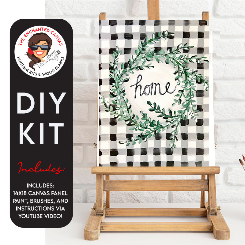 Embrace the charm of home with our DIY Greenery Wreath Painting Kit! Infuse a touch of downhome fun onto your walls with this delightful painting, featuring a cozy black and white buffalo plaid background and the word "home" nestled inside a circular greenery wreath.