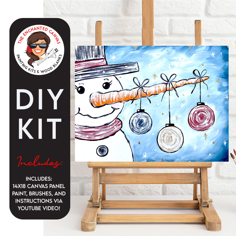  Spread the joy of winter with our Snowman with Ornaments DIY Painting Kit, featuring a cheerful snowman donning a black hat and a festive red scarf. This happy winter companion has a friendly smile and a long orange carrot nose that adds a touch of whimsy to the scene.