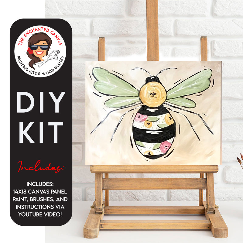 DIY Floral Bee Painting Kit featuring a peach background with a fun bee buzzing overhead. The bee is not only black and white, but has fun accents of pink and yellow flowers and greenery