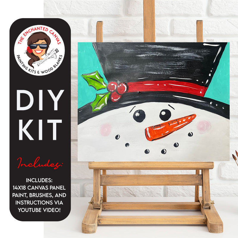 A jolly little snowman face. The white snowman face features large coal eyes and a coal smiling mouth with carrot nose. A black tophat with red band and berries fills the top of the canvas